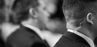 Security guard in suit with earpiece
